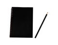 Black pen beside a black color covered single note paper diary isolated on a white background Royalty Free Stock Photo