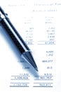 Black Pen On Financial Balance Sheet