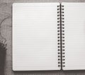 Black pencil on open white paper note book Royalty Free Stock Photo