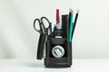 Black pencil tool holder table desk organizer isolated on white