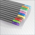 Black pencils with colored erasers on notebook in line, vector illustration Royalty Free Stock Photo