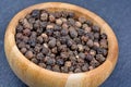 Black pepper in a bamboo bowl Royalty Free Stock Photo