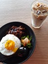 black pepper beef rice and a glass of coffee caramel machiato