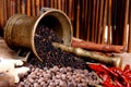 Black pepper in a bucket and bay leaf 2 Royalty Free Stock Photo