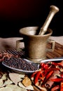 Black pepper in a bucket and bay leaf Royalty Free Stock Photo