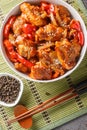 Black pepper chicken with juicy tender fillet, crisp vegetables and a rich savory black pepper sauce closeup on the bowl. Vertical Royalty Free Stock Photo