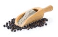 Black pepper powder in wood scoop on white background Royalty Free Stock Photo