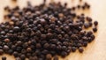 Black pepper seed at rotating display - steadicam close up