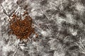 Black pepper seeds pile on black and white background. Top view. Close up Royalty Free Stock Photo