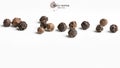 Black pepper seeds on white background Royalty Free Stock Photo