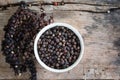 Black pepper on wood table,spices for food.