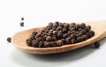 Black pepper wooden spoon Royalty Free Stock Photo