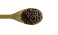 Black pepper on wooden spoon , isolated on white background, wit Royalty Free Stock Photo