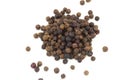 Black peppercorns scattered isolated on white background Royalty Free Stock Photo