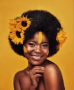 Black person, portrait and sunflower with skincare in studio for organic cosmetics, treatment or glow. Woman, smile and Royalty Free Stock Photo