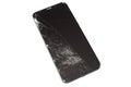 Black phone with a broken sensor and screen, cracked touchscreen glass on a white background isloate Royalty Free Stock Photo