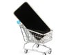 Black phone screen in the shopping cart on the white isolate