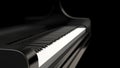 Black piano isolated on a black background - classical music Royalty Free Stock Photo