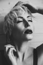 Black and white photo blonde with short hair fashion Royalty Free Stock Photo