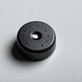 Black Piezo Buzzer on a Minimalist Background Royalty Free Stock Photo