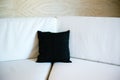 Black pillow on a sofa Royalty Free Stock Photo