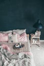 Black and pink bedroom in loft style