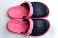 Black and pink slippers isolated on white Royalty Free Stock Photo