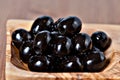 Black pitted marinated olives Royalty Free Stock Photo