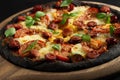 Black pizza with tomatoes, sausages, mozzarella and basil. Dough with healthy bamboo charcoal powder Royalty Free Stock Photo