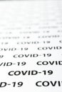 Black plain text on white paper about coronavirus outbreak. Covid-19 Royalty Free Stock Photo