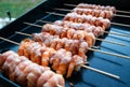 Bacon wrapped shrimp on grill Royalty Free Stock Photo