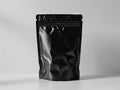 Black plastic bag mockup. A black pouch bag mockup on a white background Royalty Free Stock Photo