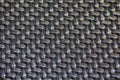 Black plastic basketwork pattern process of weaving or sewing pliable materials. Royalty Free Stock Photo