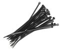 Black plastic cable ties isolated on white background. plastic wire ties closeup