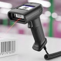 Black plastic casing and ergonomic grip scans a barcode with a Royalty Free Stock Photo