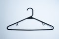 Black Plastic Clothes Hanger on White Background Royalty Free Stock Photo