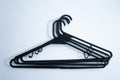 Black Plastic Clothes Hanger on White Background Royalty Free Stock Photo