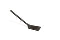 Black plastic cooking spatula isolated on a white background Royalty Free Stock Photo