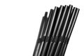 Black plastic plastic drinking straws isolated on white background Royalty Free Stock Photo