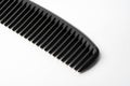 Black plastic hair comb isolated on white background Royalty Free Stock Photo