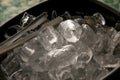 Black plastic ice bucket and stainless steel ice tongs. Royalty Free Stock Photo