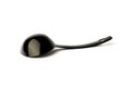 Black plastic ladle from a multicooker isolated on a white background