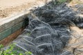 Black plastic mesh Retaining walls, concrete cubes Royalty Free Stock Photo