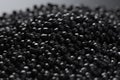 Black plastic pellets. Generate ai