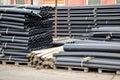 Black plastic pipes. Manufacture of plastic pipes Royalty Free Stock Photo
