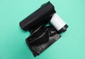 Black plastic rubbish garbage junk trash bag rolls