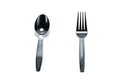 Black plastic spoon and fork isolated on white background Royalty Free Stock Photo