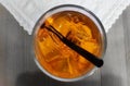 Black plastic straw in a clearglass with Aperol Spritz