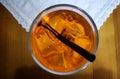 Black plastic straw in a clearglass with Aperol Spritz