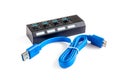 Black plastic USB 3.0 hub with blue extension cable Royalty Free Stock Photo